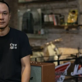 Founder Trần Mạnh Toàn của District M trong không gian store — ảnh từ bài phỏng vấn Men’s Folio